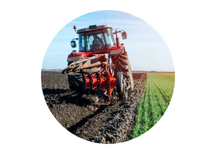 tractor ploughing field