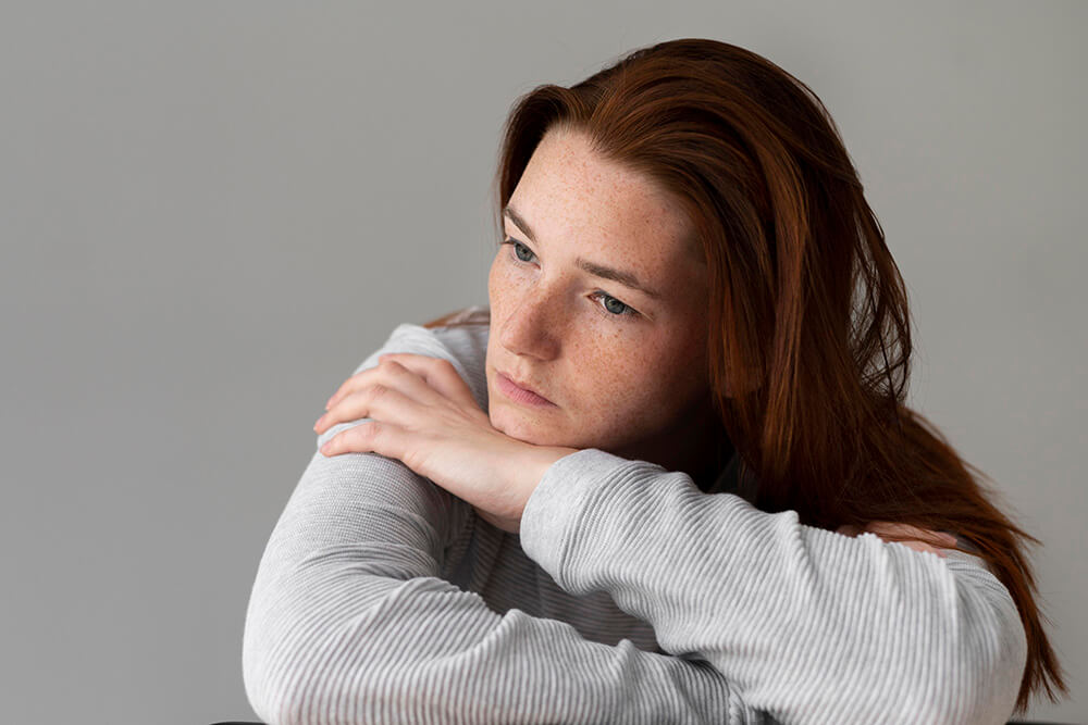 woman looking sad