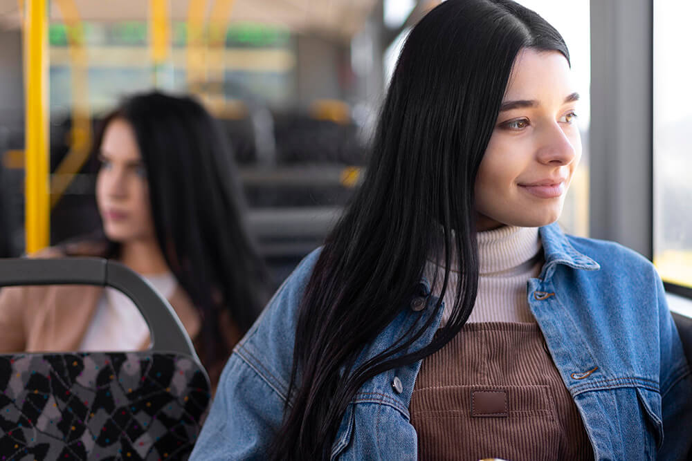 women travelling on a bus