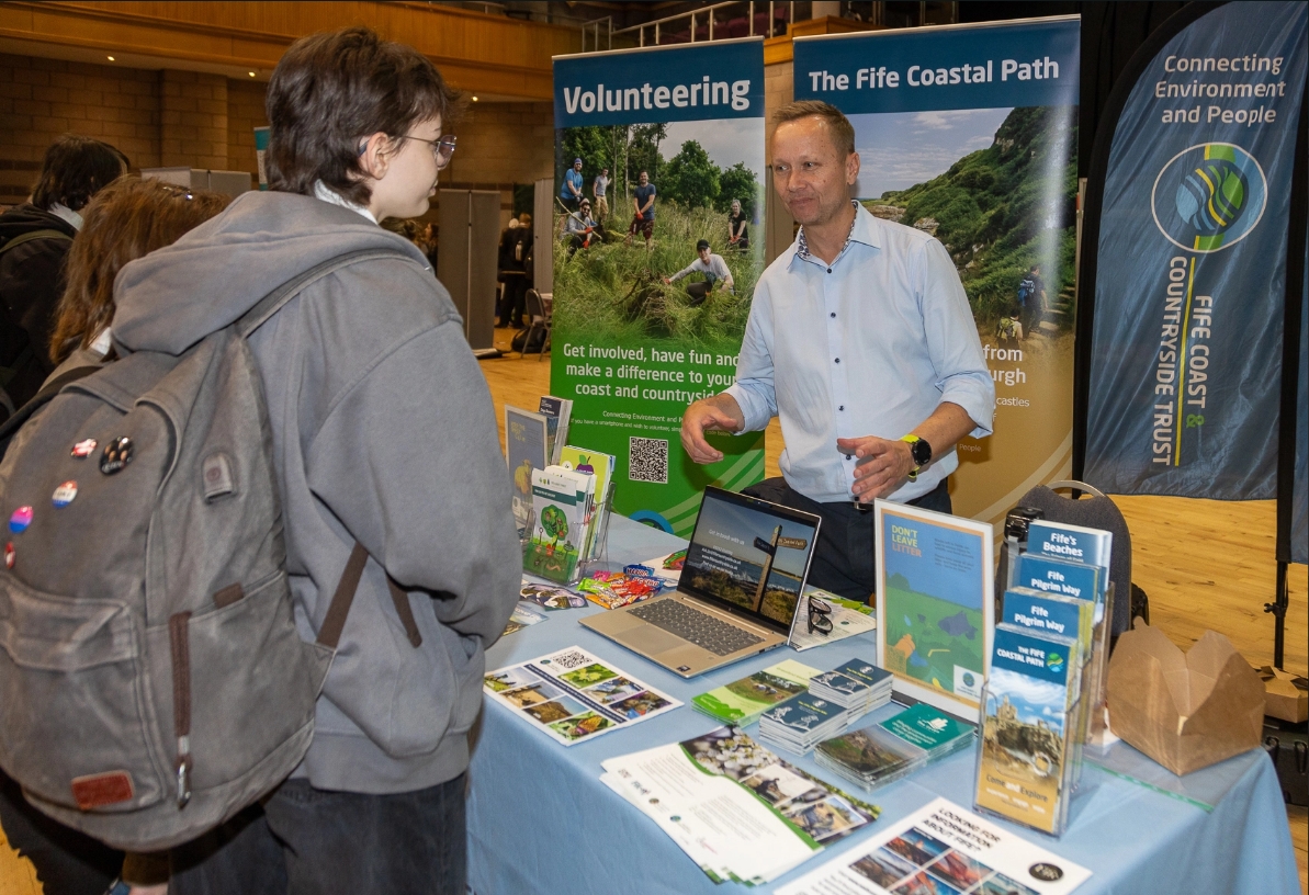 Students attending the Climate Youth Festival speak to organisations about future careers and green issues